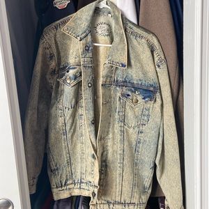 Vintage recreated jean jacket with minor bejeweled design and Joker design.